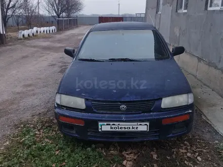 Mazda 323 1996 года за 550 000 тг. в Жетиген