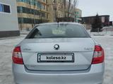 Skoda Rapid 2015 года за 5 200 000 тг. в Актобе – фото 4