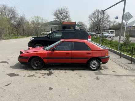 Mazda 323 1994 года за 580 000 тг. в Алматы – фото 3