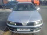 Mitsubishi Carisma 2002 годаүшін1 800 000 тг. в Атырау