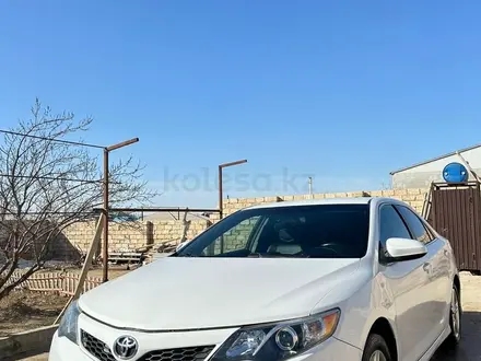 Toyota Camry 2014 года за 6 100 000 тг. в Жанаозен – фото 8