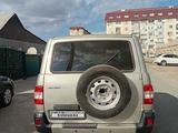 УАЗ Patriot 2013 года за 4 000 000 тг. в Атырау – фото 4