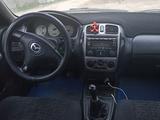 Mazda 323 2001 года за 1 650 000 тг. в Алматы – фото 3