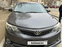 Toyota Camry 2014 года за 9 300 000 тг. в Жанаозен