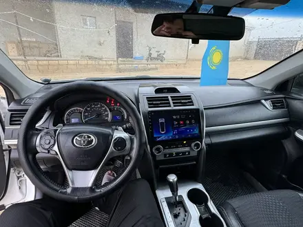 Toyota Camry 2012 года за 7 850 000 тг. в Жанаозен – фото 17