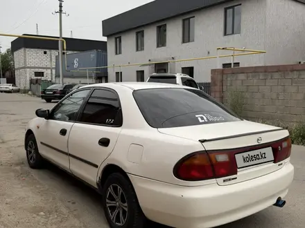 Mazda 323 1995 года за 630 000 тг. в Алматы – фото 4