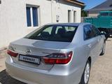 Toyota Camry 2014 года за 11 600 000 тг. в Астана – фото 2
