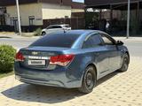 Chevrolet Cruze 2011 года за 1 750 000 тг. в Шымкент – фото 4