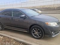 Toyota Camry 2013 года за 8 500 000 тг. в Атырау