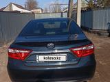 Toyota Camry 2014 года за 11 000 000 тг. в Актобе – фото 4