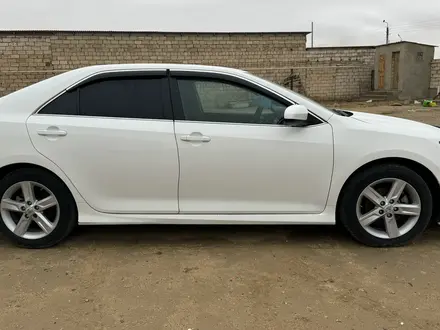 Toyota Camry 2012 года за 7 700 000 тг. в Жанаозен – фото 2