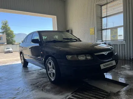 Mazda 626 1998 года за 1 300 000 тг. в Мерке – фото 2