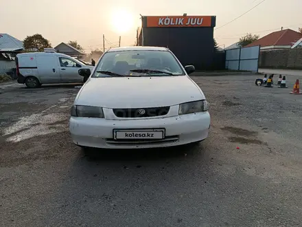 Mazda 323 1997 года за 800 000 тг. в Алматы – фото 2