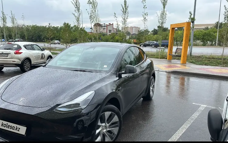Tesla Model Y 2023 года за 18 000 000 тг. в Астана