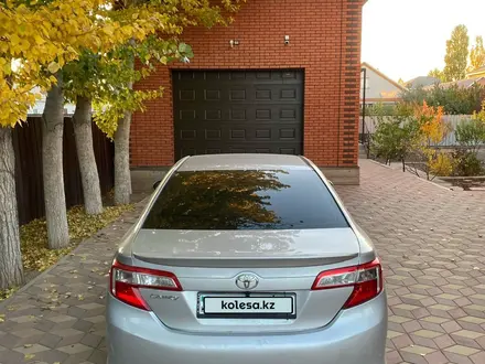 Toyota Camry 2013 года за 9 500 000 тг. в Актобе – фото 7