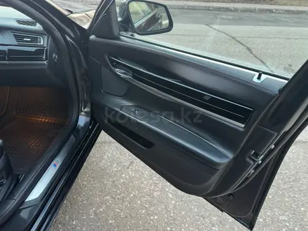 BMW 750 2012 года за 11 500 000 тг. в Астана – фото 15