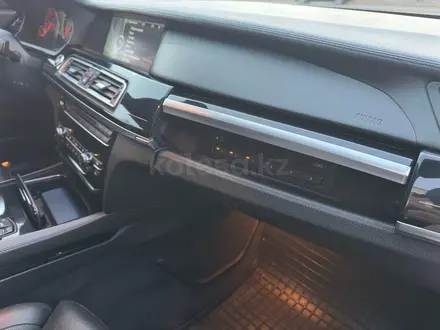 BMW 750 2012 года за 11 500 000 тг. в Астана – фото 27