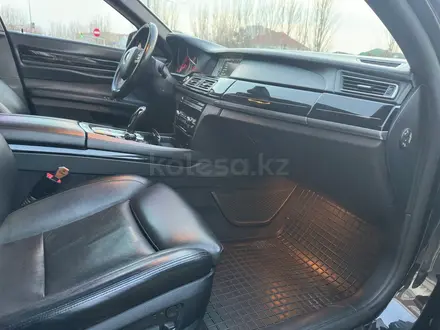 BMW 750 2012 года за 11 500 000 тг. в Астана – фото 28