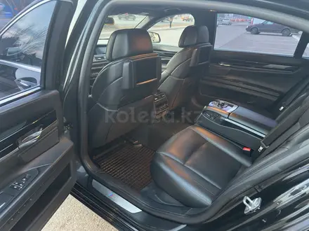 BMW 750 2012 года за 11 500 000 тг. в Астана – фото 35