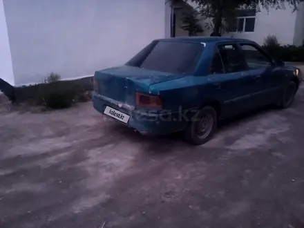 Mazda 323 1992 года за 600 000 тг. в Жанакорган – фото 5