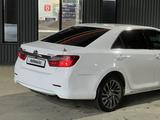 Toyota Camry 2014 годаfor8 350 000 тг. в Актобе