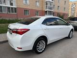Toyota Corolla 2014 года за 6 800 000 тг. в Астана – фото 4