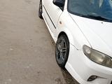 Mazda Familia 2001 года за 2 000 000 тг. в Усть-Каменогорск – фото 2