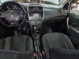 Renault Logan 2018 года за 2 850 000 тг. в Актобе – фото 5