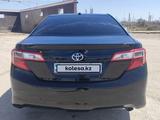 Toyota Camry 2013 года за 7 800 000 тг. в Шиели – фото 4