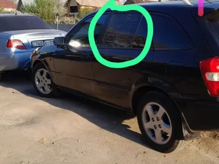 Mazda 323 1998 года за 1 600 000 тг. в Алматы – фото 12