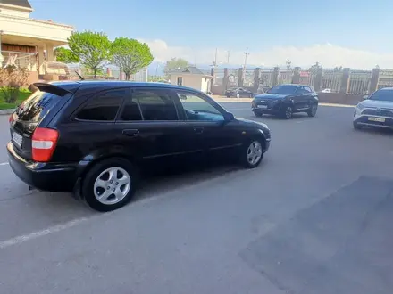 Mazda 323 1998 года за 1 600 000 тг. в Алматы – фото 4