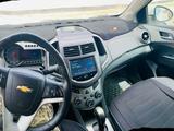 Chevrolet Aveo 2015 года за 4 500 000 тг. в Актау – фото 4