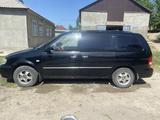 Kia Carnival 2004 года за 3 000 000 тг. в Турара Рыскулова – фото 2