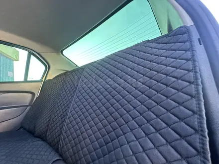 Renault Logan 2014 года за 2 300 000 тг. в Актобе – фото 10