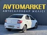 Renault Logan 2014 года за 2 300 000 тг. в Актобе – фото 3