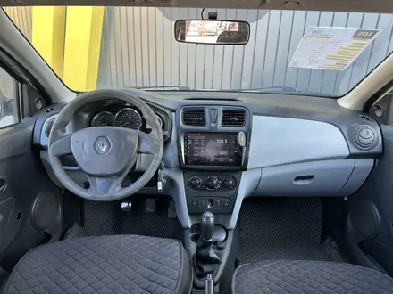 Renault Logan 2014 года за 2 300 000 тг. в Актобе – фото 9