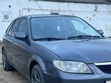 Mazda 323 2003 года за 2 200 000 тг. в Актобе – фото 4