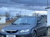 Mazda 323 2003 года за 2 200 000 тг. в Актобе – фото 5