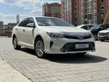 Toyota Camry 2015 года за 11 700 000 тг. в Актобе