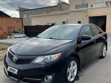 Toyota Camry 2014 года за 6 400 000 тг. в Атырау – фото 2