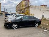 Toyota Camry 2014 года за 6 400 000 тг. в Атырау – фото 4