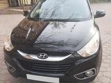 Hyundai Tucson 2013 годаүшін8 000 000 тг. в Караганда – фото 2