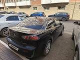 Mitsubishi Lancer 2010 годаүшін4 990 990 тг. в Астана – фото 2