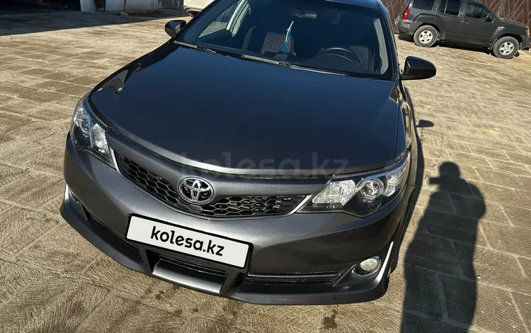 Toyota Camry 2013 года за 7 500 000 тг. в Жанаозен