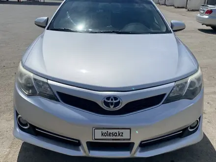Toyota Camry 2014 года за 5 700 000 тг. в Актобе