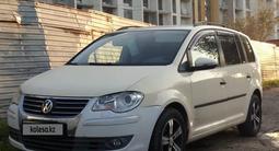 Volkswagen Touran 2010 годаүшін3 700 000 тг. в Алматы
