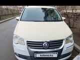 Volkswagen Touran 2010 года за 3 700 000 тг. в Алматы – фото 2