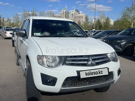 Mitsubishi L200 2011 года за 7 500 000 тг. в Астана