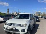 Mitsubishi L200 2011 годаүшін7 500 000 тг. в Астана – фото 5