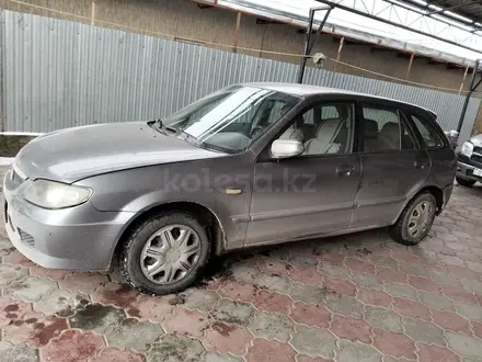 Mazda 323 2002 года за 1 300 000 тг. в Алматы – фото 2